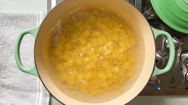 Pasta cooking in pot on stovetop