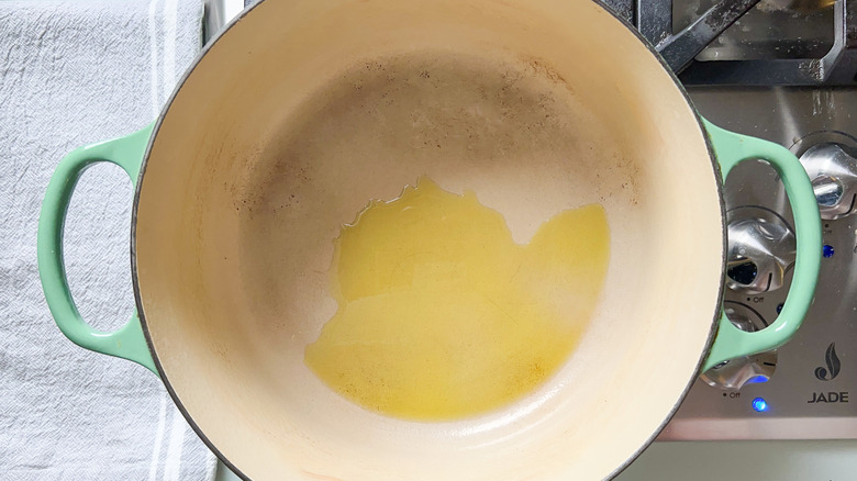 Olive oil in pot on stovetop