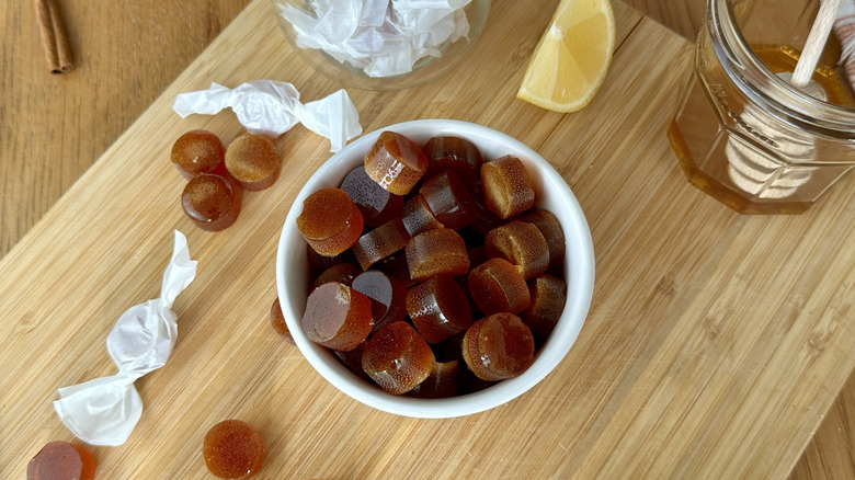 Wrapped and piled ginger hard candies