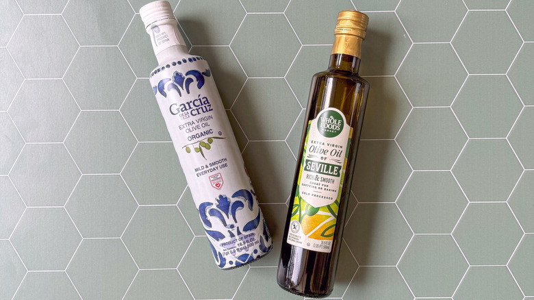 2 bottles of Spanish olive oil on countertop