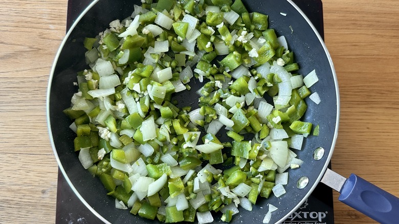 garlic in pan with onions and pepper