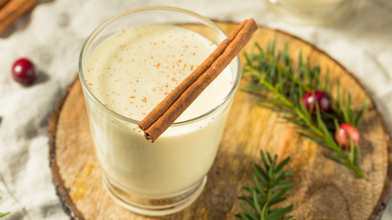 eggnog in glass with cinnamon