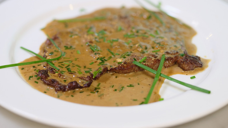 plate of Steak Diane with chives