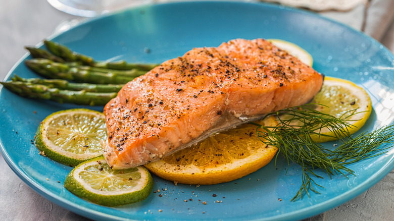 Salmon fillet over citrus slices