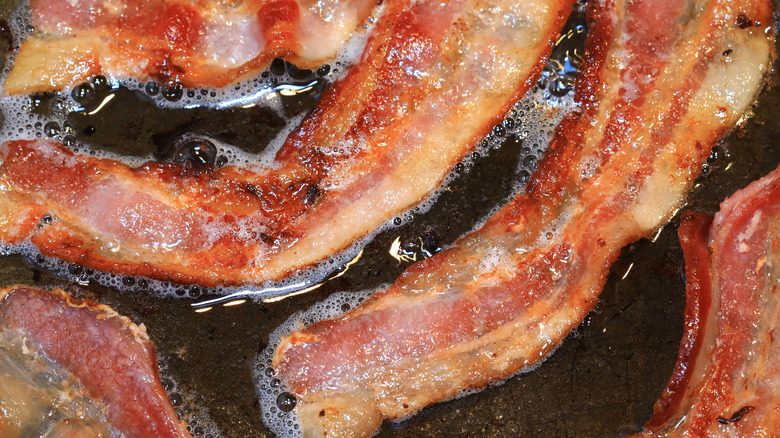 Bacon frying in pan