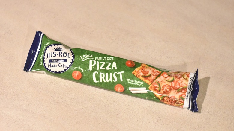 A package of Jus-Rol large family size pizza crust