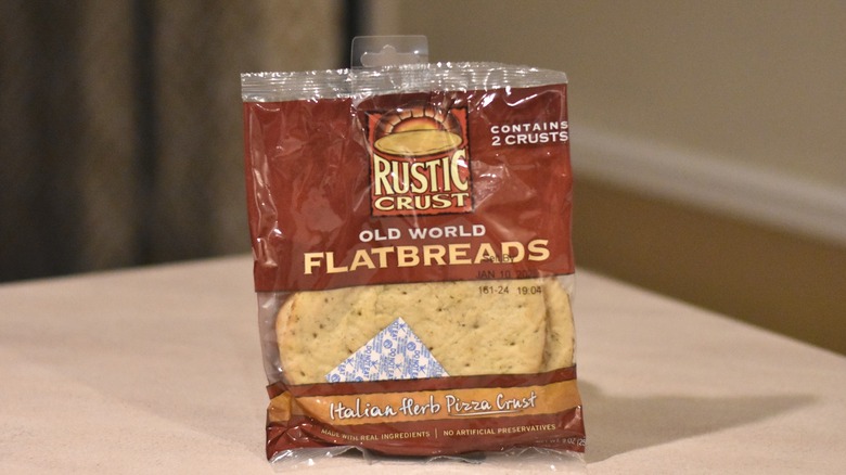 A package of Rustic Crust old world flatbreads Italian herb pizza crust