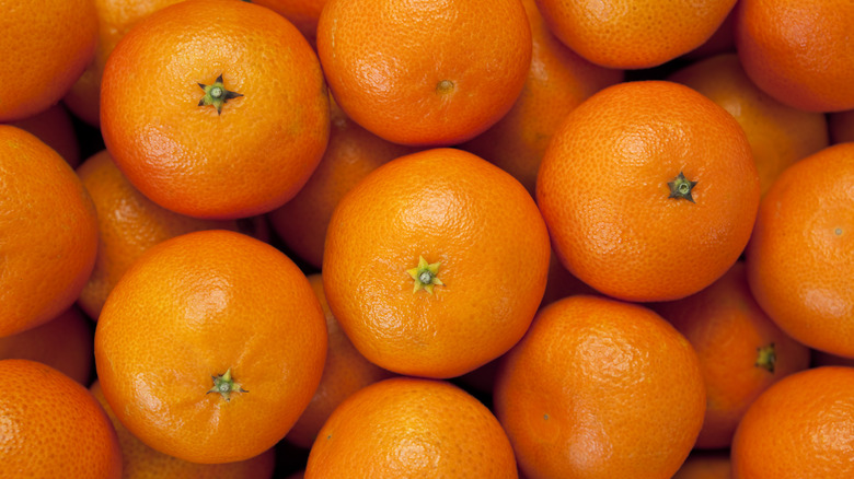 close up of many tangerines. 