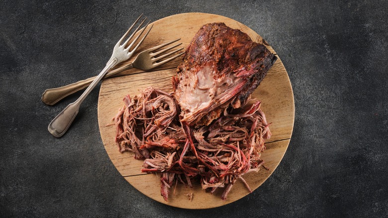 Pulled pork on cutting board