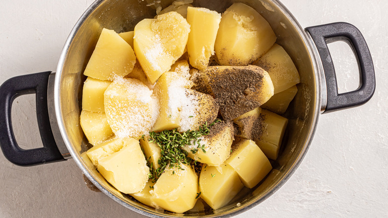 seasonings over cooked potatoes