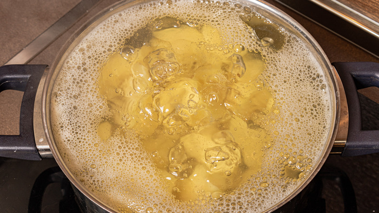 potatoes boiling on stovetop