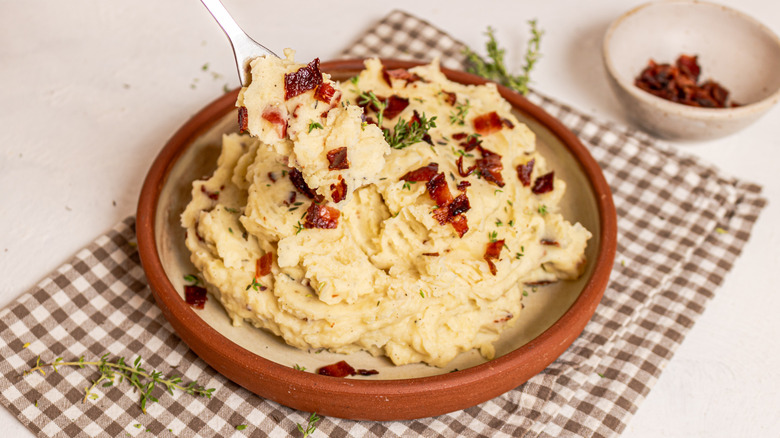 spooning bacon mashed potatoes