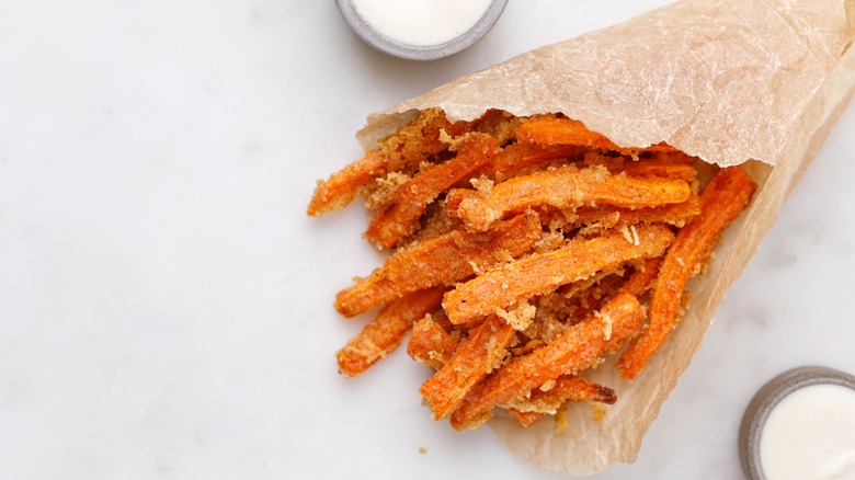 Carrot fries in paper wrapper