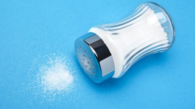 spilled shaker of salt