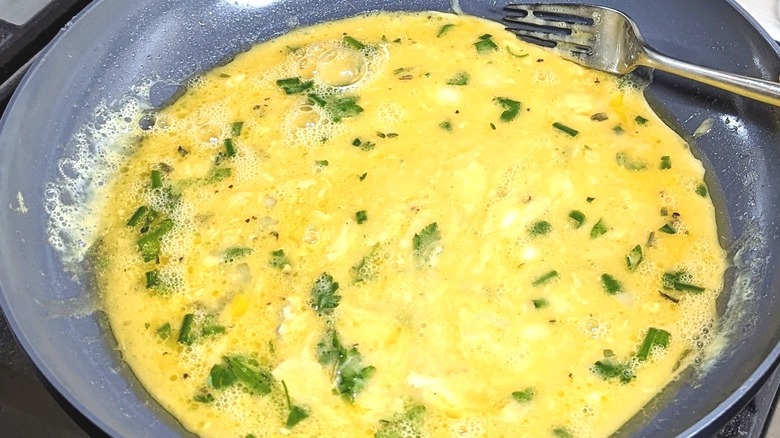 French omelette in frying pan