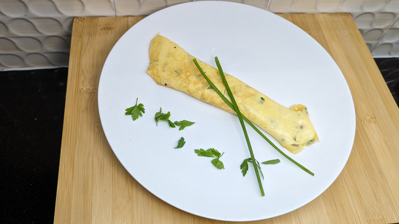 French omelette on white plate