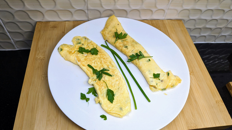 Two French omelettes on plate