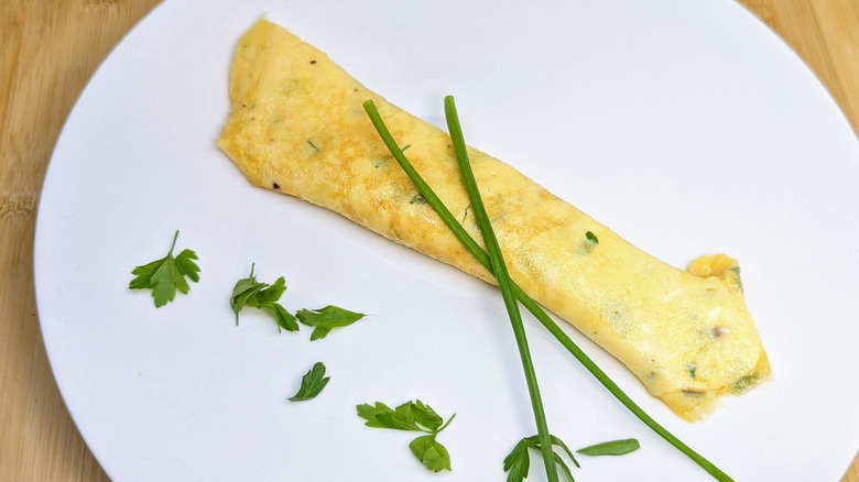 Folded French omelette on plate