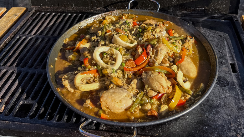 Paella pan on barbecue