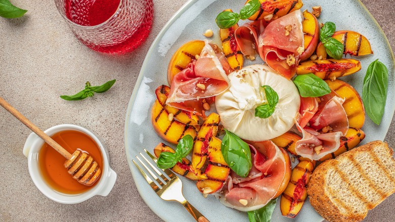 Grilled peaches, burrata, prosciutto and honey