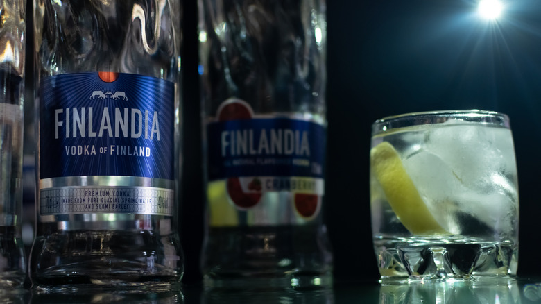 Bottles of Finlandia vodka with a cocktail in the foreground