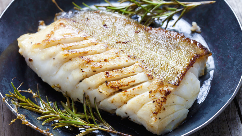 Fish filet in black pan