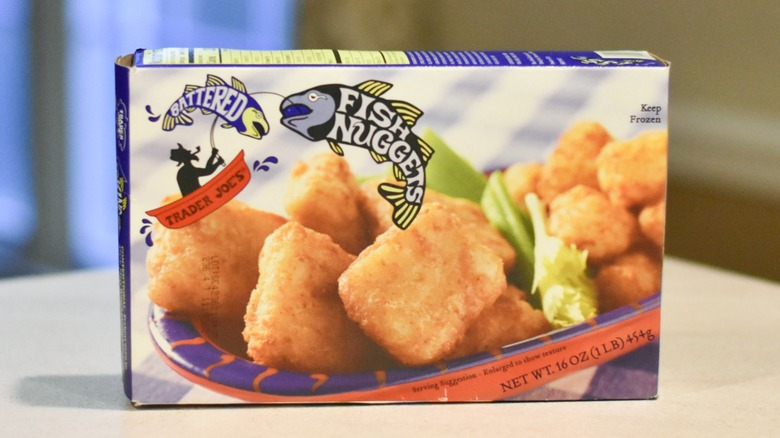 A box of fish nuggets from Trader Joe's on a white counter