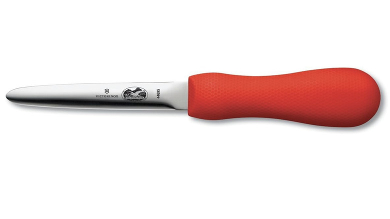A Victorinox knife with red handle