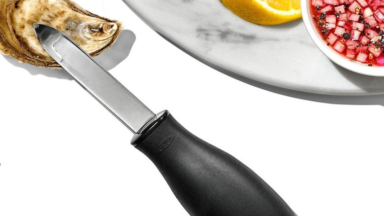 the OXO Good knife with oysters, lemon, and mignonette sauce