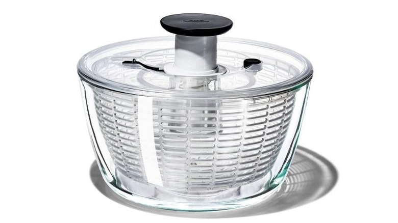 OXO glass bowl salad spinner on white background