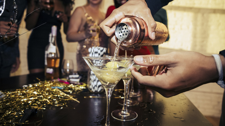 Bartenders pouring martinis