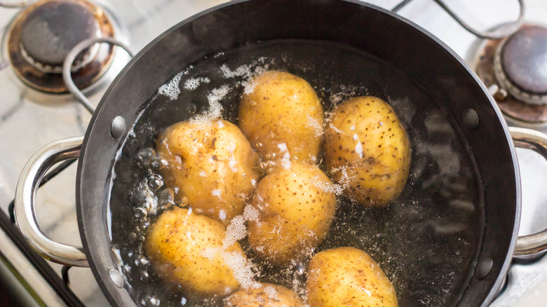 potatoes boiling in pot