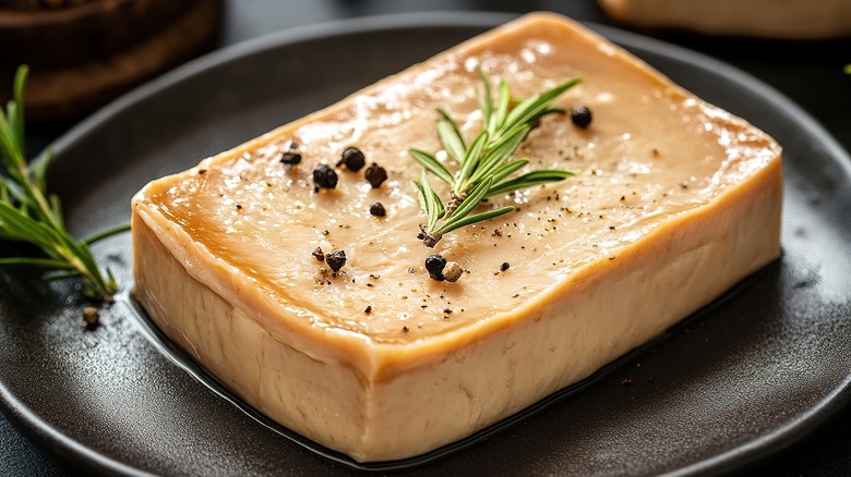 Foie gras on black plate