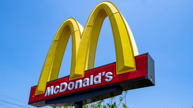 McDonalds signage in front of a restaurant