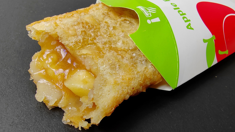 Fried apple pie with a bite taken out of it from a McDonald's in Malaysia