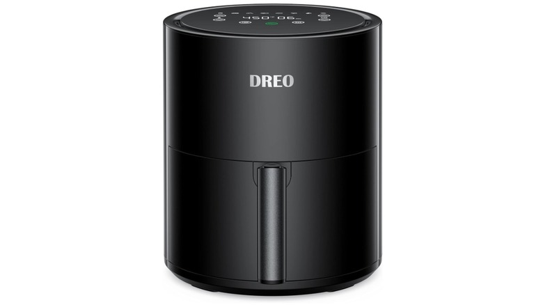 Dreo 9-in-1 Digital Airfryer on counter next to healthy meal