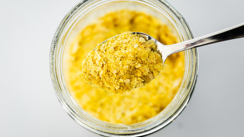 Bowl of nutritional yeast flakes