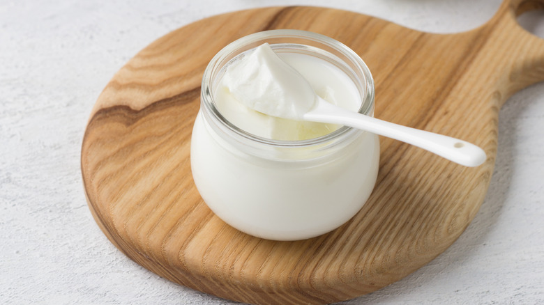 Creamy yogurt in glass jar