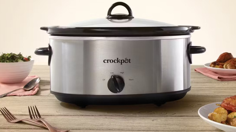 Crock-Pot Manual 7-Quart Slow Cooker on a rustic table