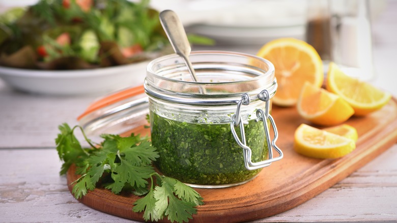 green marinade in glass jar