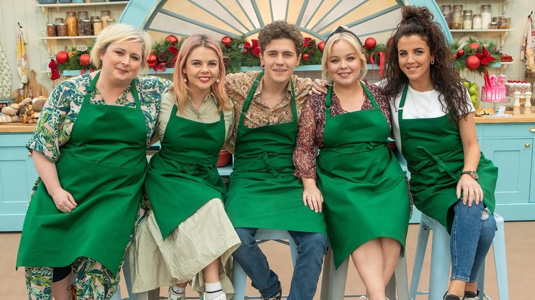 Cast of Derry Girls posing for Great British Baking Show shot