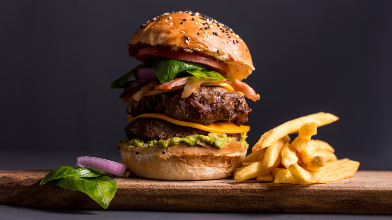 Double decker burger with fries