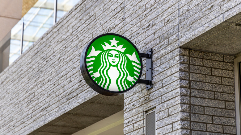 Close-up of the Starbucks mermaid logo