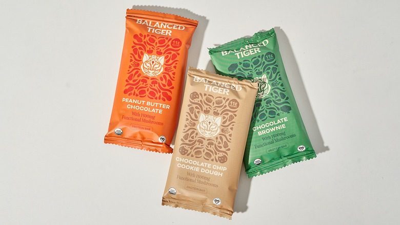 Balanced Tiger protein bars on a table