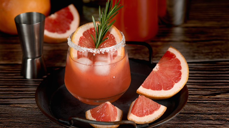 Paloma with rosemary and cut grapefruit