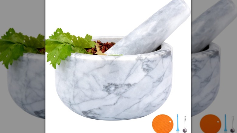 A marble bowl and pestle