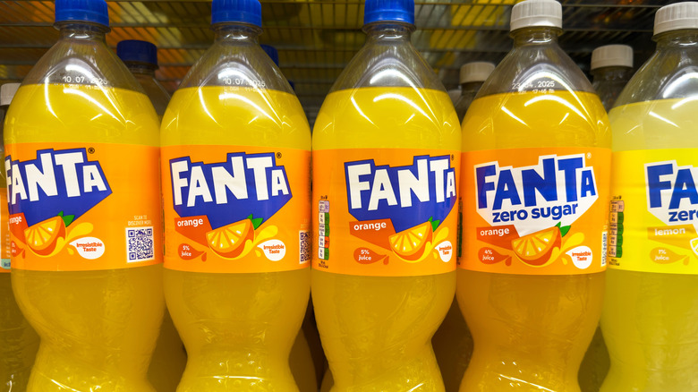 Fanta bottles on a grocery store shelf