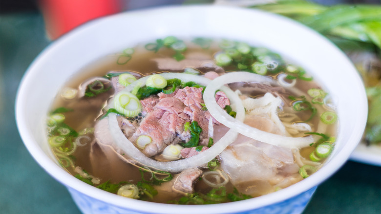 Rare beef pho and tendons