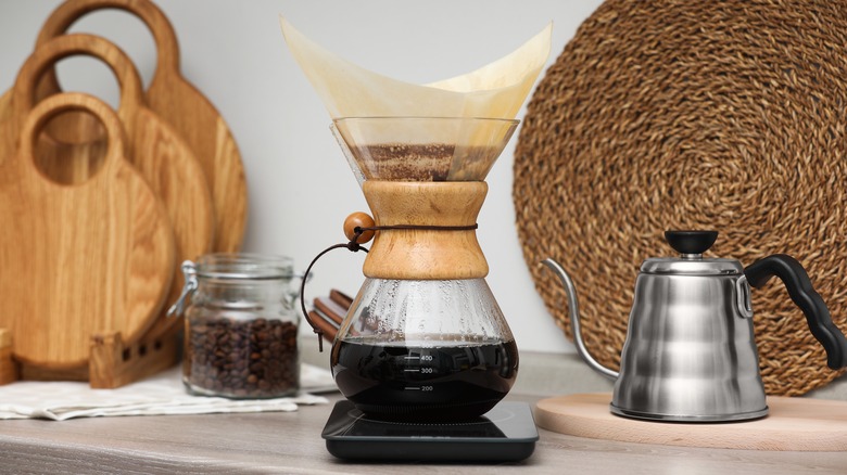 Chemex brewer with beans on table