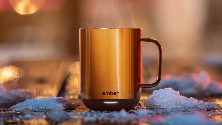 Ember mug next to melting snow